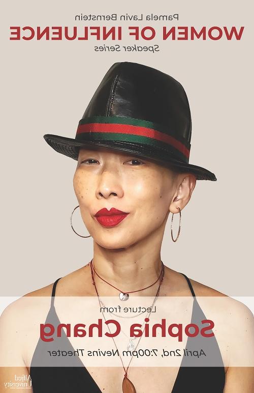 sophia chang wearing bright red lipstick and a black fedora with matching red stripe